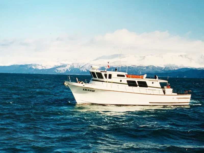 a small boat in a large body of water