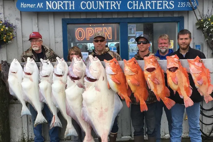 a person holding a fish