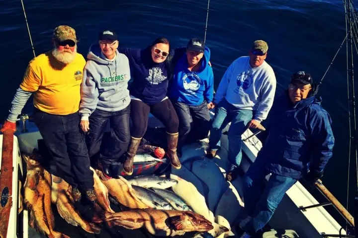 a group of people posing for the camera