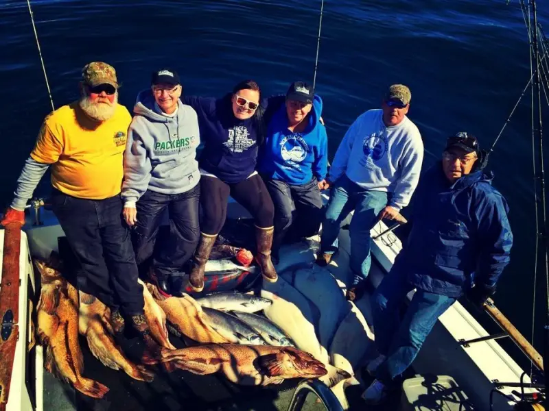 a group of people posing for the camera