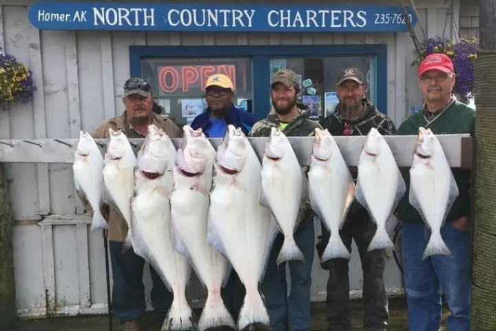a person holding a fish