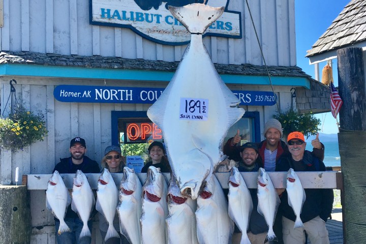 a group of people standing in front of a building
