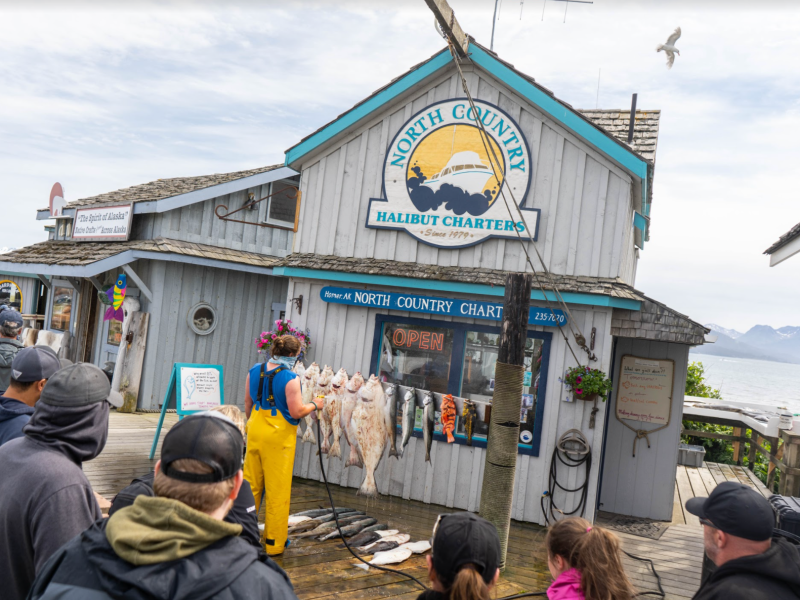 a group of people standing in front of a building