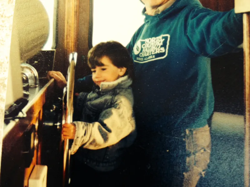 a person standing in front of a mirror posing for the camera