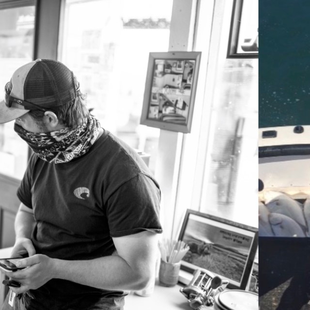 a group of people sitting in front of a laptop